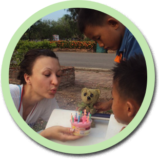 Galina playing with children